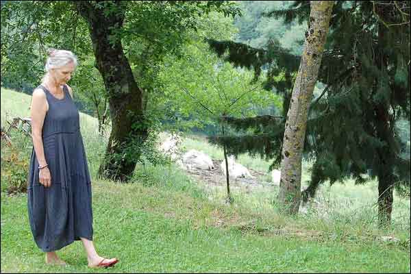 A women practicing Walking Meditation during a Silent Retreat